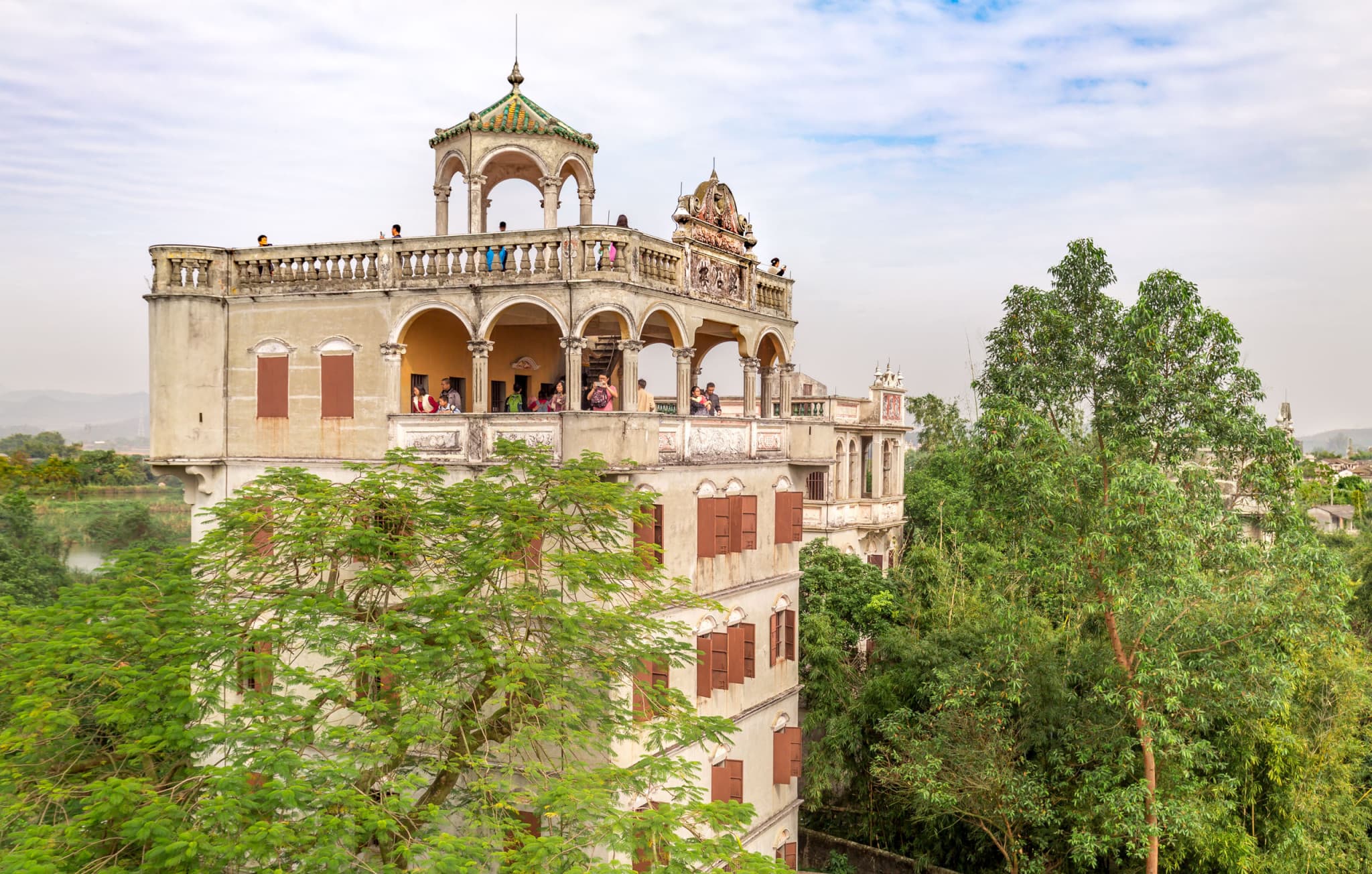 A scenic view of kaiping diaolou and villages