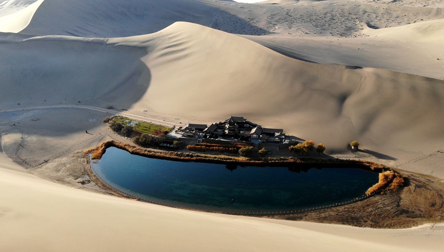 Exploring the Enchanting Mingsha Mountain and Crescent Spring